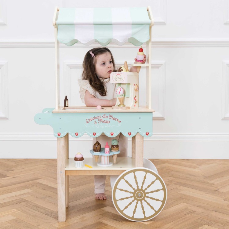 TV327-ice-cream-trolley-child-serving-ice-cream-to-customers.jpg