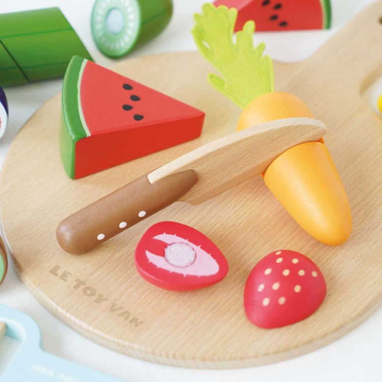 TV355-chopping-board-fruit-and-veg-being-cut-by-knife.jpg