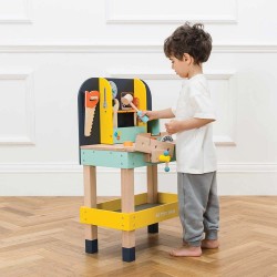TV475-alex-s-workbench-placing-hammer-on-tool-shelf.jpg