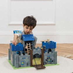 TV235-excalibur-castle-boy-placing-flag-pole-into-turret.jpg