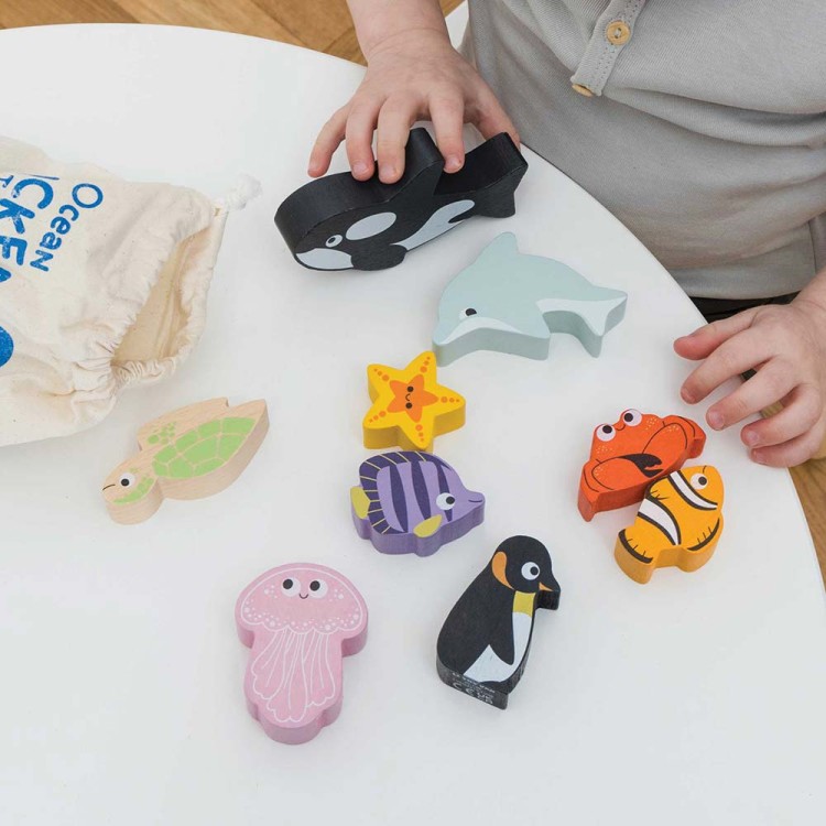 PL139-ocean-stacker-childs-hands-placing-whale-on-table-top.jpg