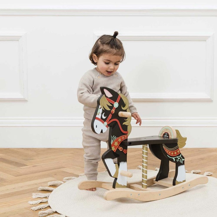 PL140-carnival-rocking-horse-gold-detailing-boy-smiling-at-animal-friend.jpg