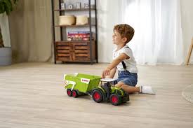 Przejdź do produktu Dickie Toys Traktor FARM z przyczepą 64 cm — realistyczna zabawka świetlno-dźwiękowa